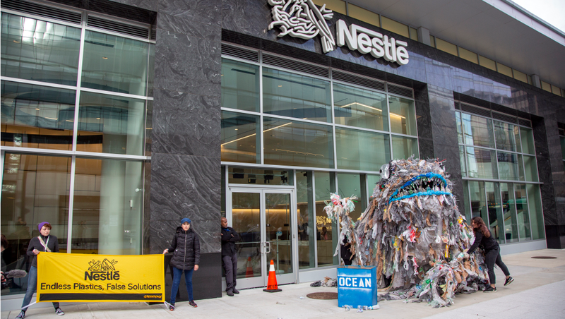 Illustration for article titled Activists Deliver Giant Trash Monsters to Nestlé Headquarters to Protest Plastic Pollution